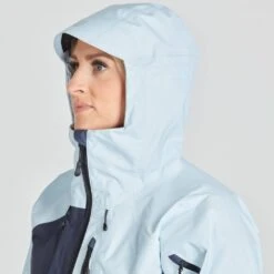 NRS High Tide Jacket - Women's 7 NRS High Tide Jacket - Women's -4Corners Riversports 20037 02 CloudNavy Model Hood 070121 1000x1000 841cf281 cddd 4052 ba09 553263942c7a